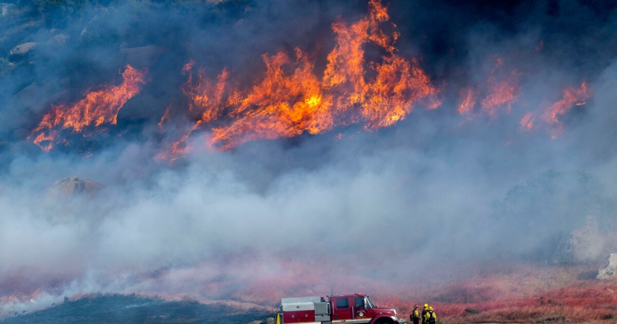 Calmer winds aid crews battling California’s Springs Fire